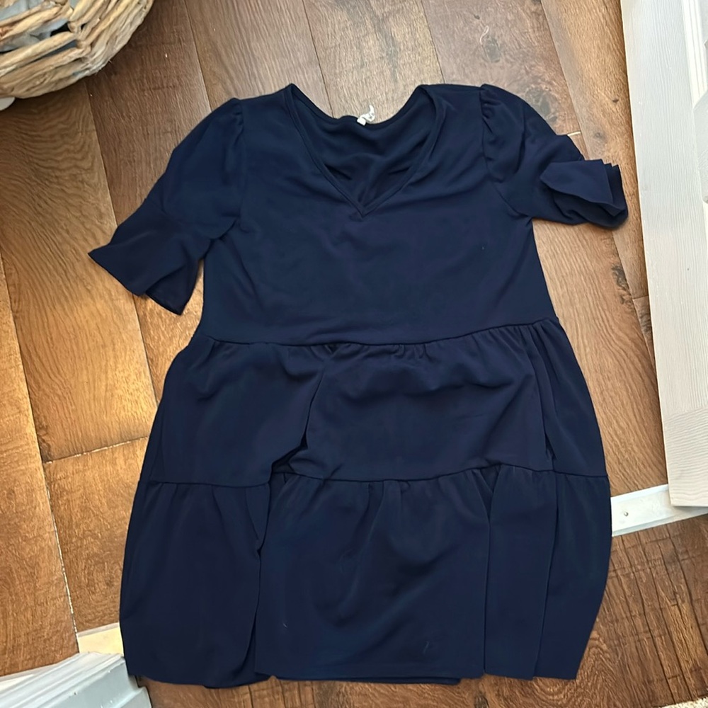 Blue knee length dress.